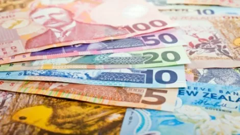 NZ dollar gains vs. Australian dollar on RBA rate view, as dairy auction, Fed awaited